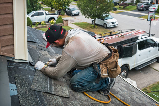 Professional Roofing technician working in Trenton, IL